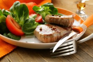 dietplanetbeef-steak-grilled-with-fresh-salad-garnishshutterstock_131918594-1100x733.jpg
